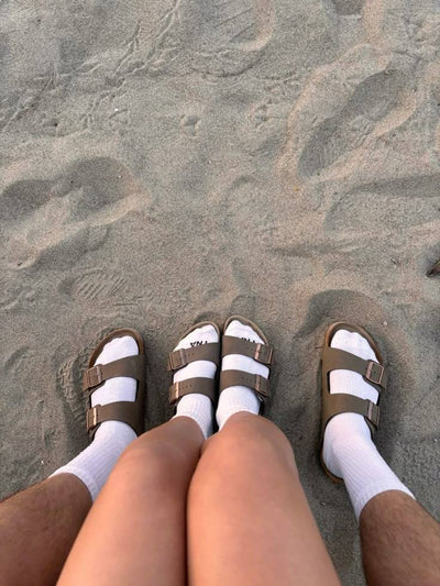 Customer walking wearing Cloggs clogs