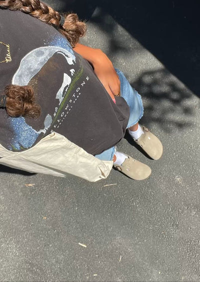 Customer wearing Cloggs clogs outdoors