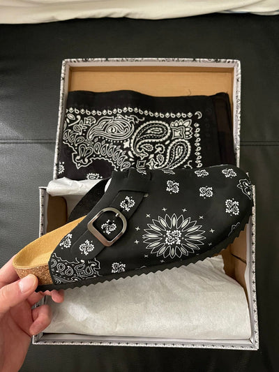 Customer wearing Cloggs clogs outdoors